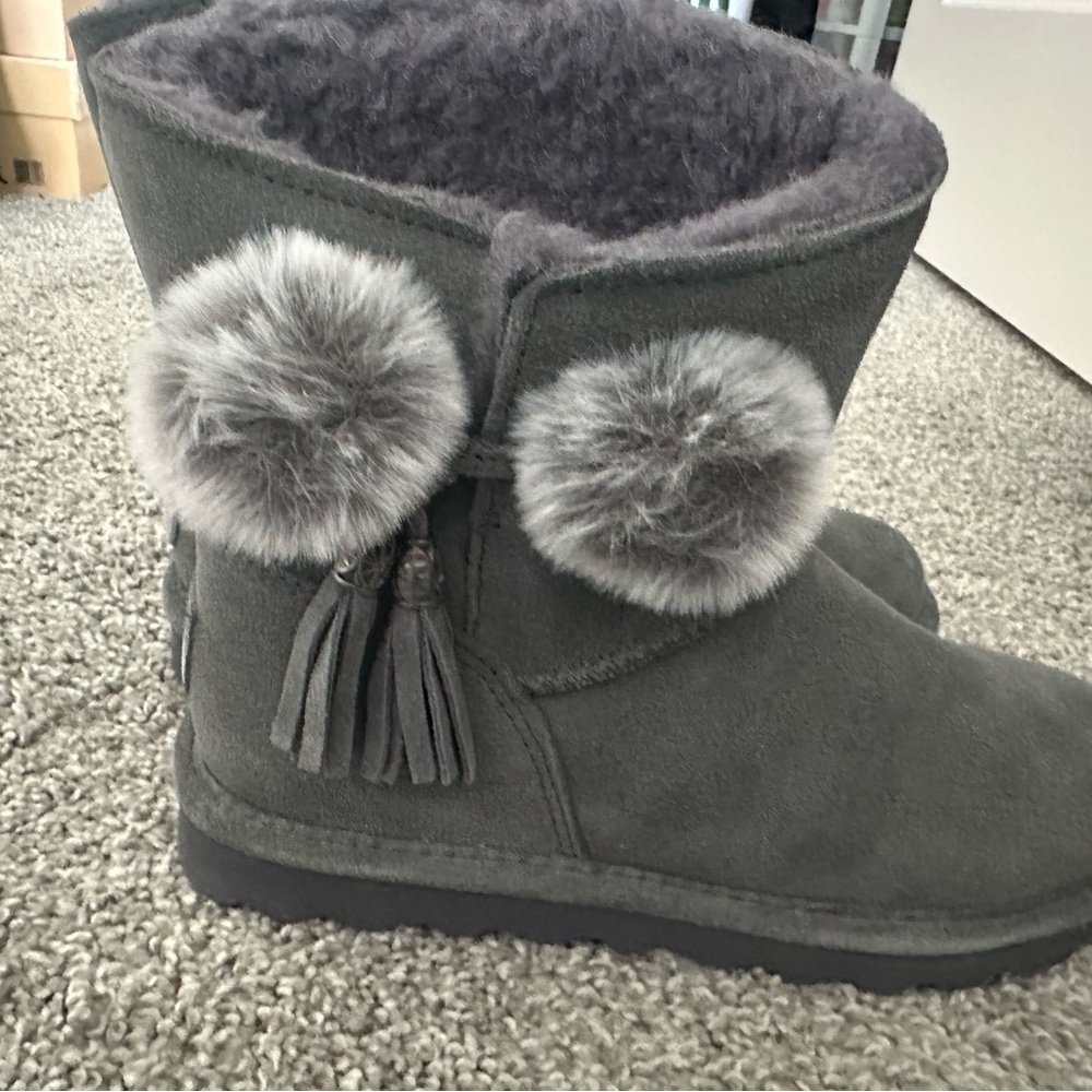 Bear paw *Brand New*.                       Gray Suede Boots with Pom Poms